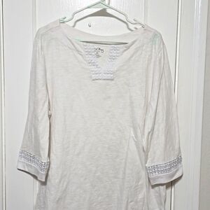 Coral Bay White V Neck. Lace around Sleeves and Neck.